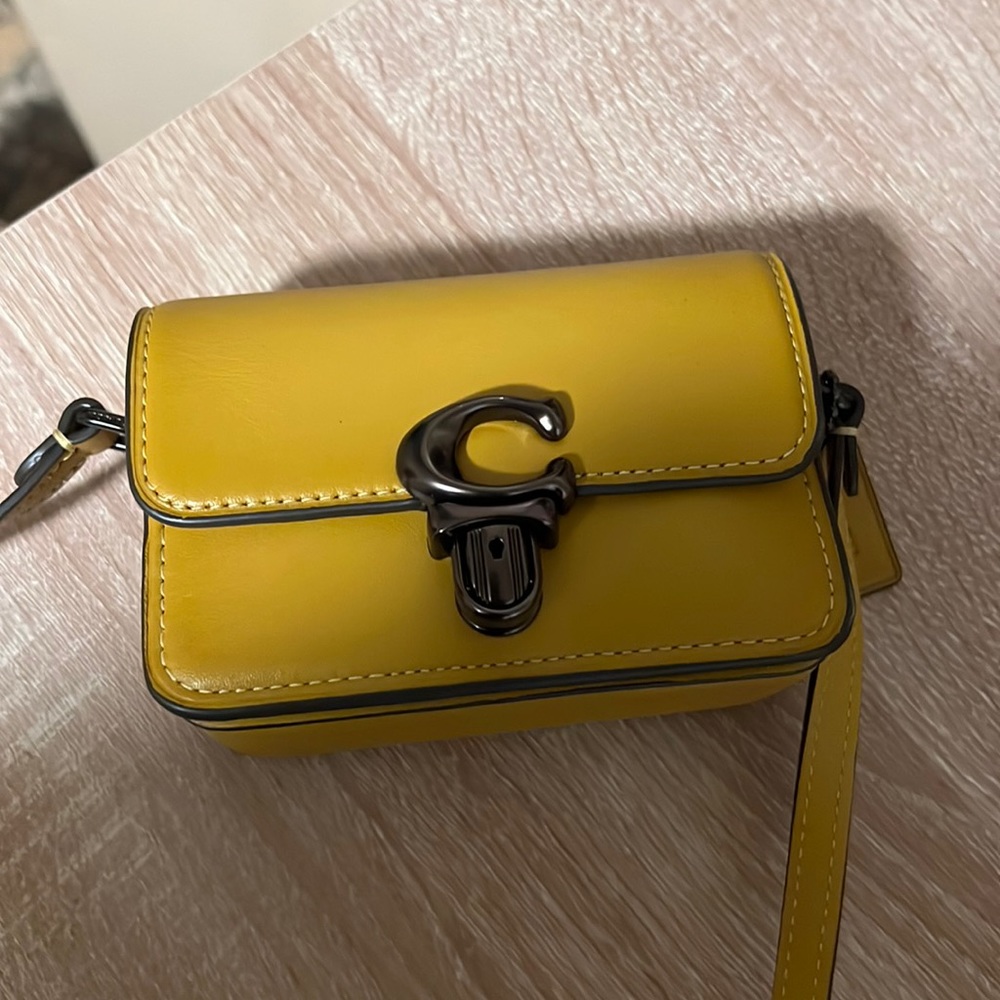 Coach crossbody it’s very cute and convenient brand new studio collection